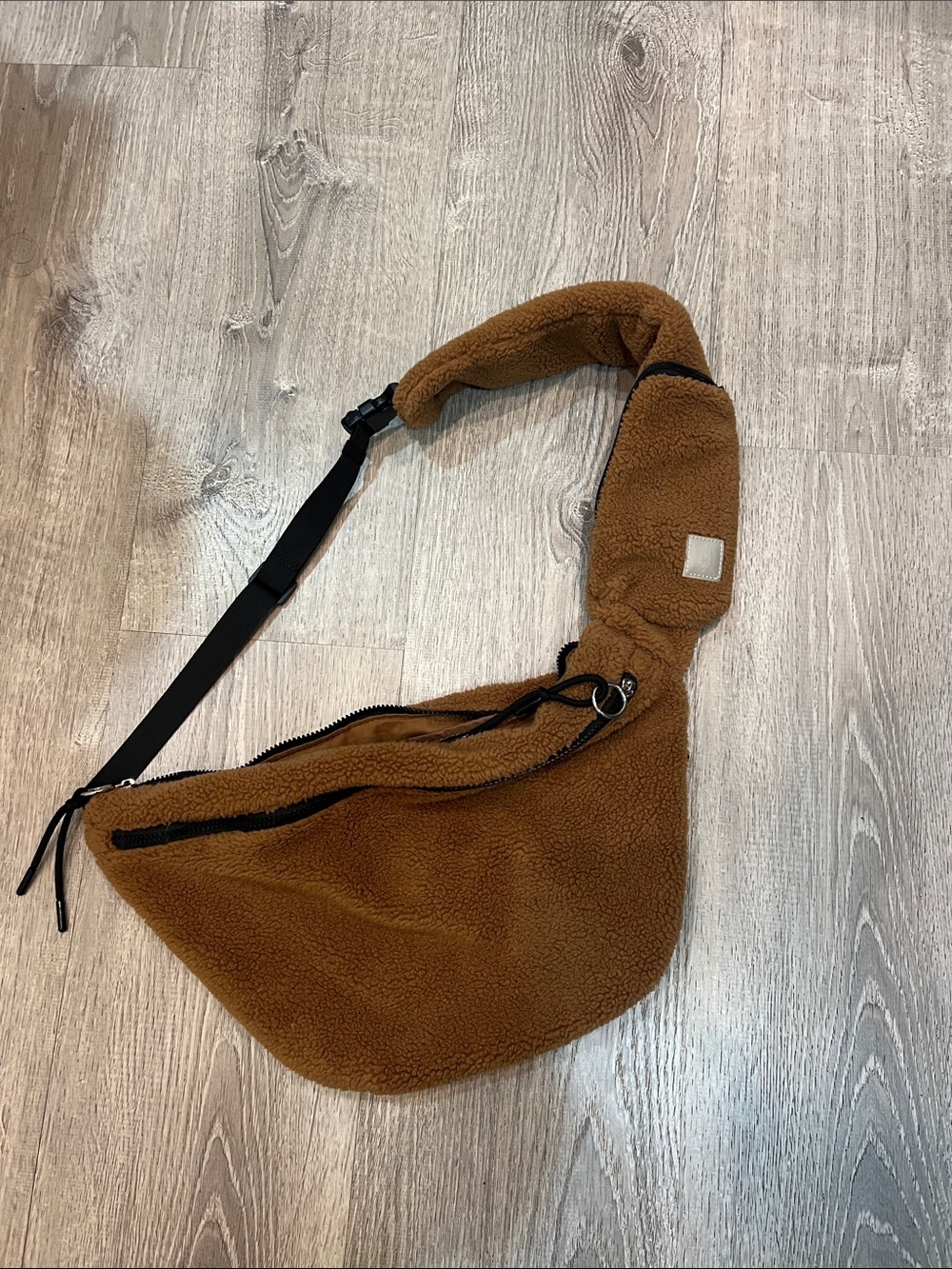 Free People overachiever 
Brown Sherpa Sling Crossbody Bag